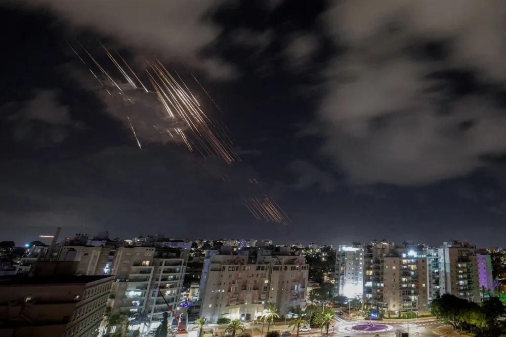 Israel's Iron Dome system intercepting missiles in the night sky